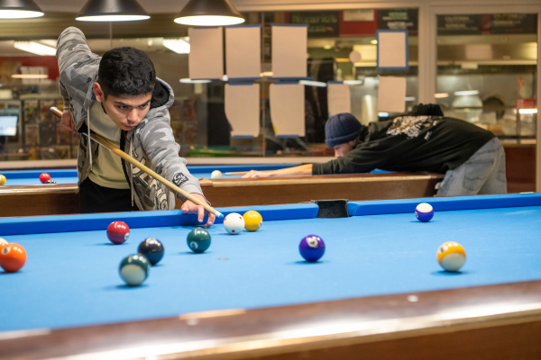 Students playing pool in CCSC