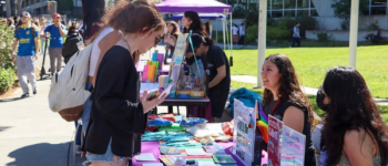 CAPS Tabling on campus, talking with students